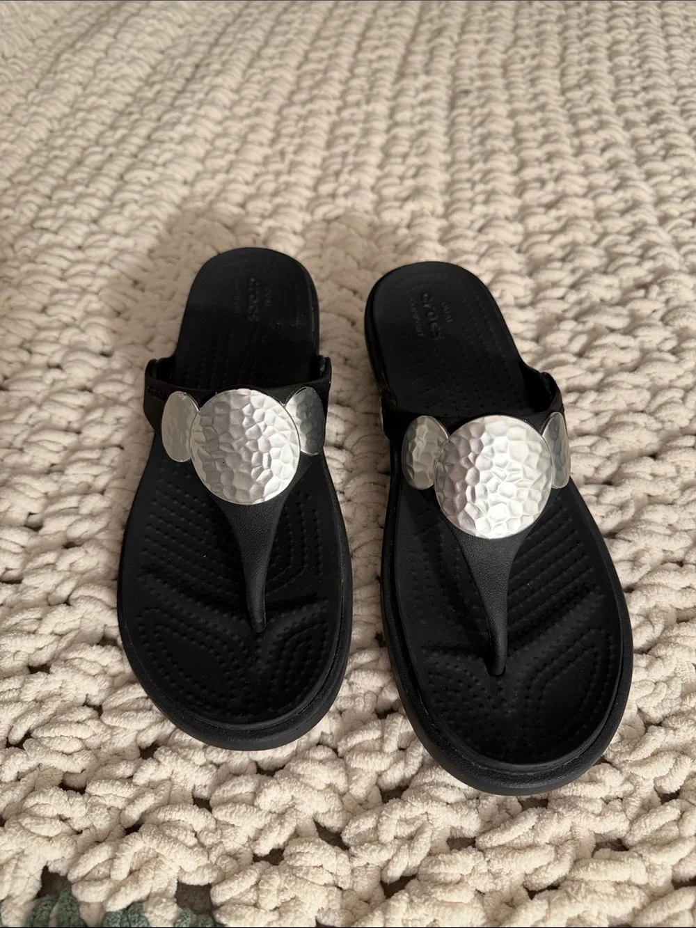 CROCS Black Thong Sandals with Silver Hammered Discs